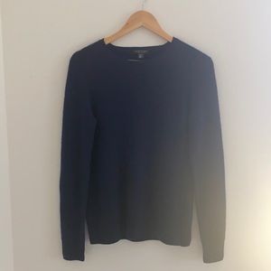 Looks and feels brand new, never worn nor washed.